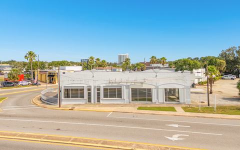 Front of the former dealership showroom at 118 Fairview Ave, seen from across Fairview Avenue